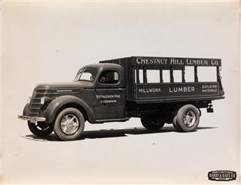 (TRUCKING AND TRANSPORT) Contemporary binder containing 112 photographs of commercial vehicles, most with hand-lettered signage.